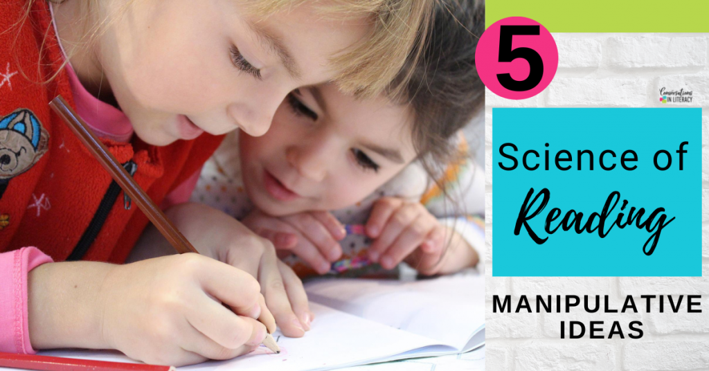 2 girls looking at a notebook by Conversations in Literacy